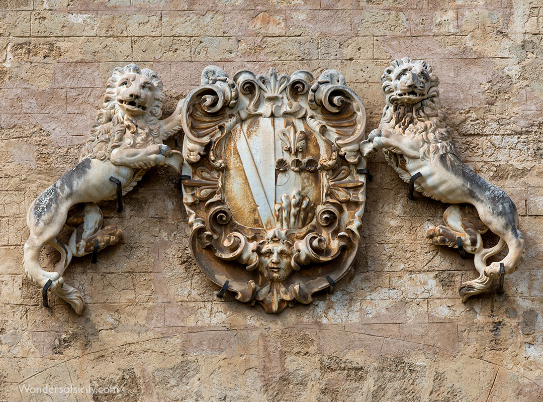 The coat of arms on the facade was likely installed by the Sandoval family, who owned the castle from 1635 to 1806.